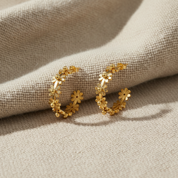 Pendientes elegantes con flores doradas